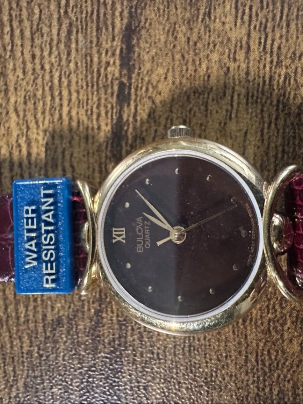 Bulova Quartz Women's Gold Tone Watch – Black Dial, Burgundy Leather Strap